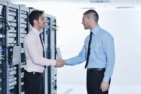 Stock photo: it engineers in network server room