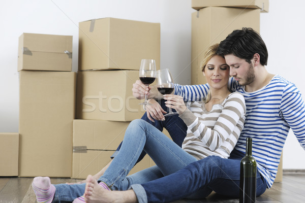Young couple moving in new home Stock photo © dotshock