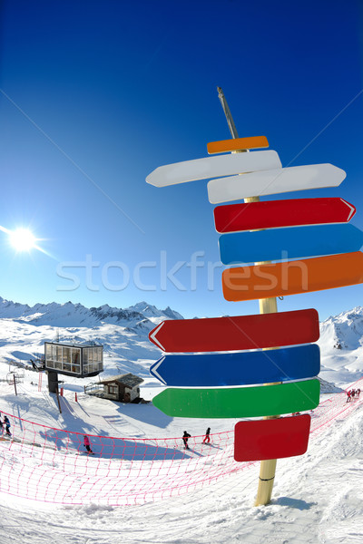 Stock photo: Sign board at High mountains under snow in the winter