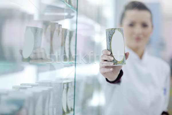 pharmacist chemist woman standing in pharmacy drugstore Stock photo © dotshock