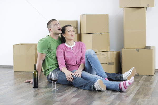 Young couple moving in new home Stock photo © dotshock