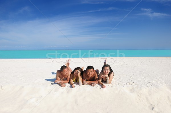 group of happy young people have fun on bach Stock photo © dotshock