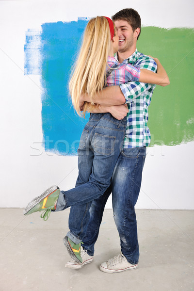 Boldog pár festék fal új otthon fiatal pér Stock fotó © dotshock