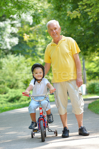 Boldog nagyapa gyermek park jókedv játék Stock fotó © dotshock