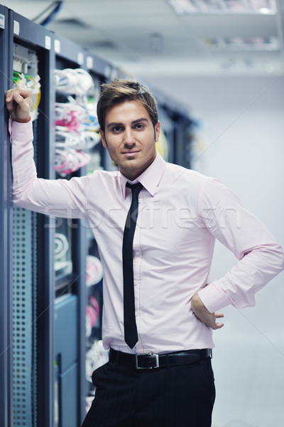young it engeneer in datacenter server room Stock photo © dotshock