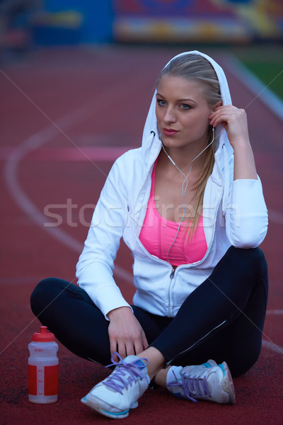 Sportos nő sportos versenypálya fiatal futó Stock fotó © dotshock