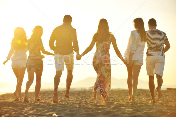 Stock foto: Glücklich · Jugendlichen · Gruppe · Spaß · Strand · laufen