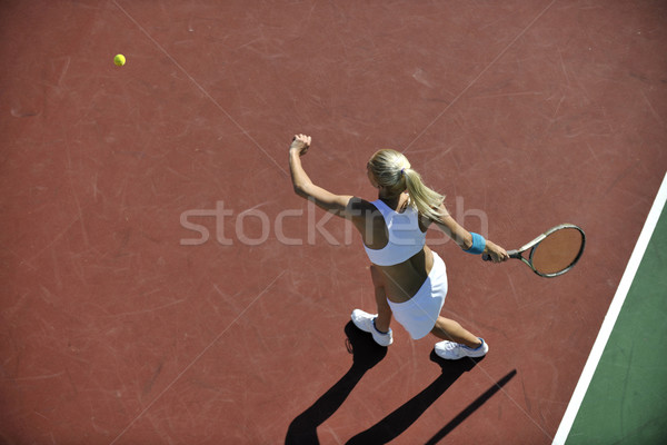 young woman play tennis outdoor Stock photo © dotshock