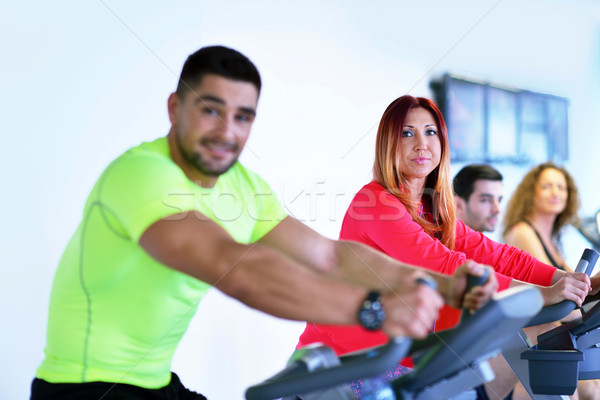 Group of people running on treadmills Stock photo © dotshock