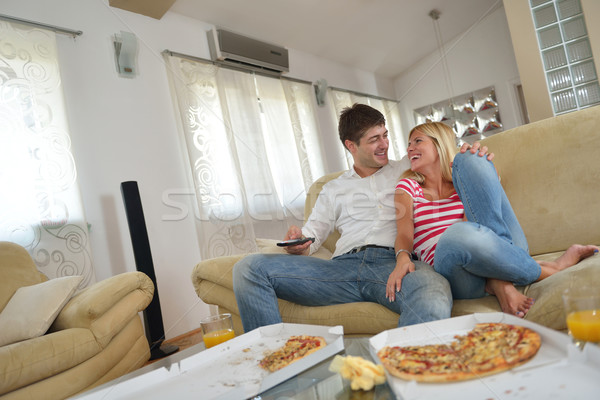couple at home eating  pizza Stock photo © dotshock