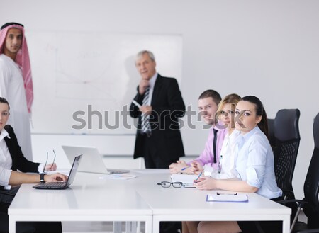 Senior business man giving a presentation Stock photo © dotshock