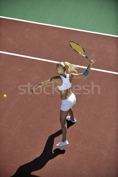 young woman play tennis outdoor Stock photo © dotshock