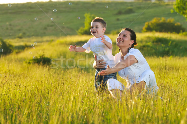 Nő gyermek buborék boldog szabadtér játszik Stock fotó © dotshock