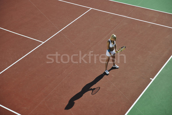 Stock photo: young woman play tennis outdoor