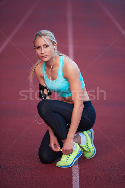 Sportlich Frau sportlich Rennstrecke jungen Läufer Stock foto © dotshock