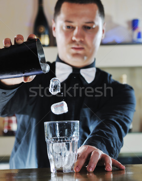 pro barman prepare coctail drink on party Stock photo © dotshock