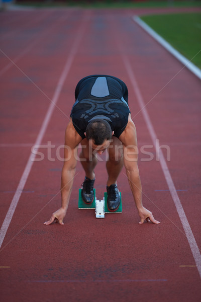 Athletic man start Stock photo © dotshock