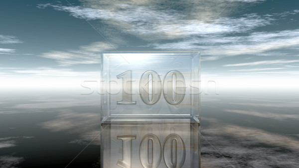 number one hundred in glass cube under cloudy sky - 3d rendering Stock photo © drizzd