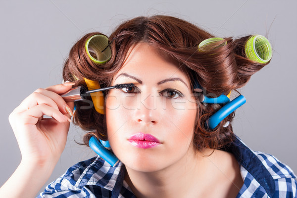 girl applying mascara Stock photo © dukibu