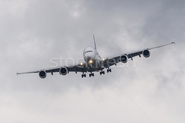 Stock photo: Passenger airliner in bad weather