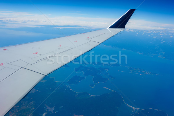 Wing of an airplane in flight Stock photo © dutourdumonde