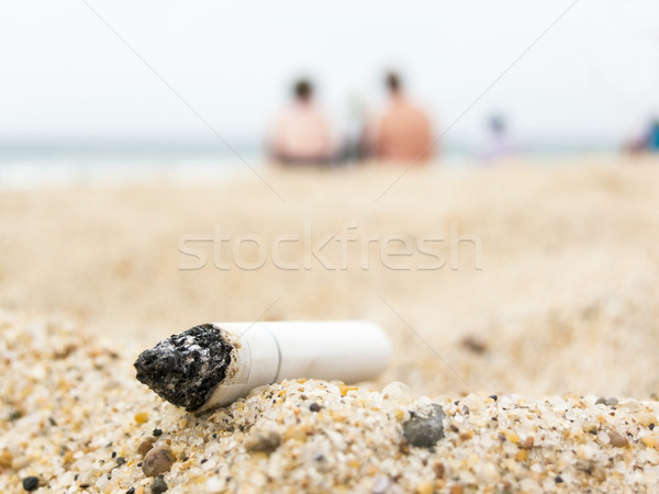 Cigarrillo trasero playa contaminación mar belleza Foto stock © dutourdumonde