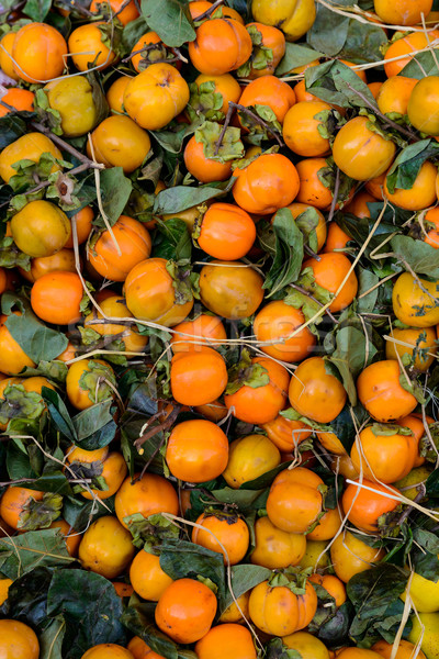 Kaki fruits on a market stall Stock photo © dutourdumonde