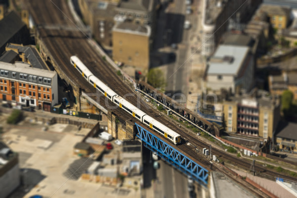 Train on a bridge in London, tilt-shift effect Stock photo © dutourdumonde