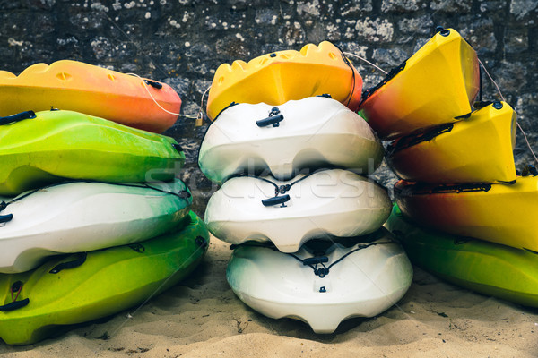 Stacked kayaks on a beach Stock photo © dutourdumonde