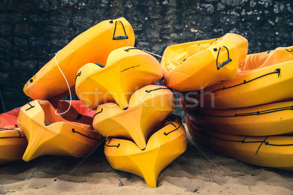 Stacked kayaks on a beach Stock photo © dutourdumonde