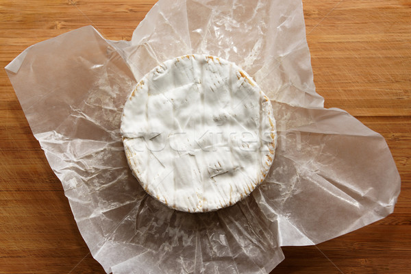 Stock photo: Camembert on a wooden board