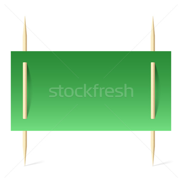 Green paper on toothpicks Stock photo © dvarg