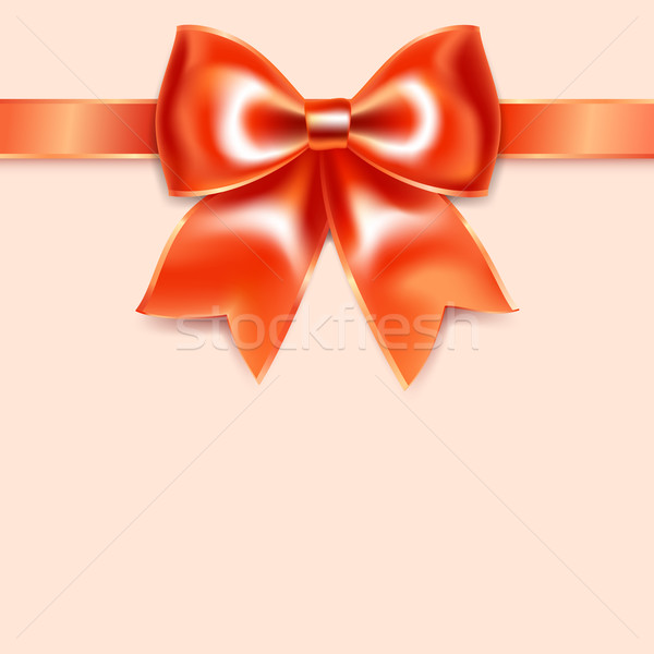 Red bow of silk ribbon, isolated on pink background Stock photo © Ecelop