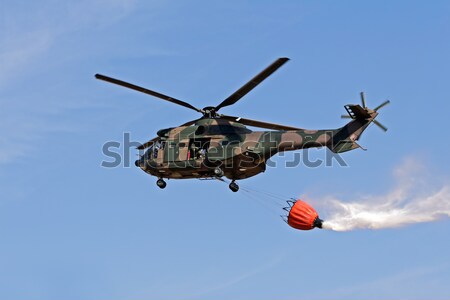 Militar helicóptero vuelo dramático cielo metal Foto stock © EcoPic