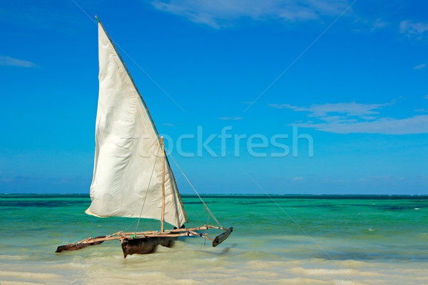 Wooden sailboat on water Stock photo © EcoPic