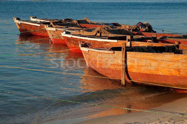 Wooden boats on beach Stock photo © EcoPic