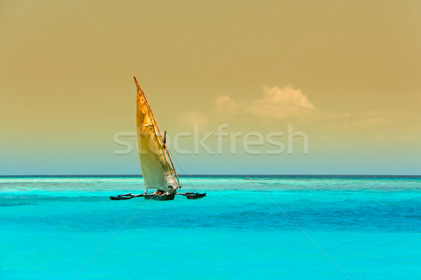 Wooden sailboat on water Stock photo © EcoPic