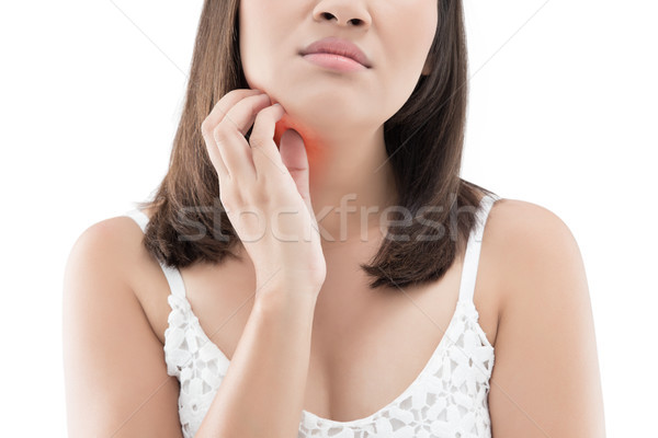 Woman itching his chin isolated on white background Stock photo © eddows_arunothai