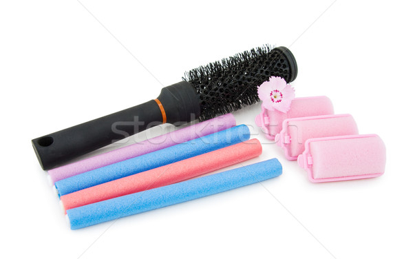Hair brush and curlers on white Stock photo © Eireann