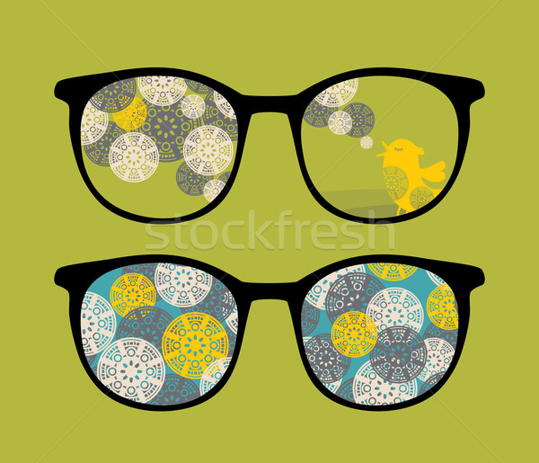 Retro eyeglasses with birds reflection in it.  Stock photo © ekapanova