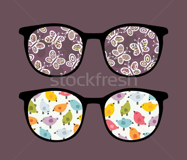 Stock photo: Retro sunglasses with reflection in it.