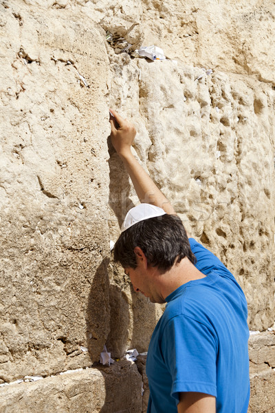 Stock photo: Placing a Note in the Wailing Wall