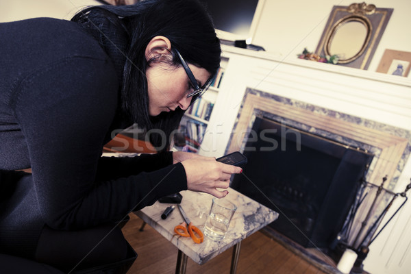 Using Smartphone at Living Room Stock photo © eldadcarin