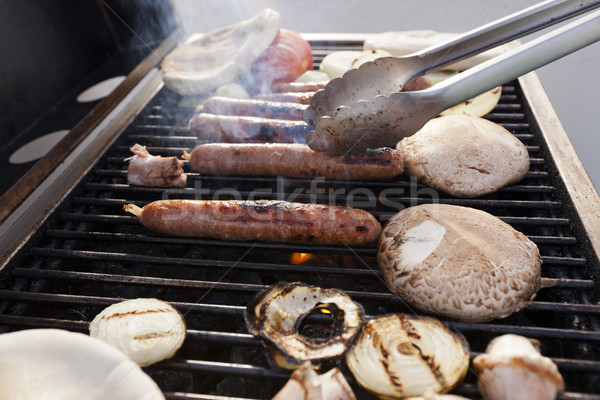 Lifting a Sausage Stock photo © eldadcarin