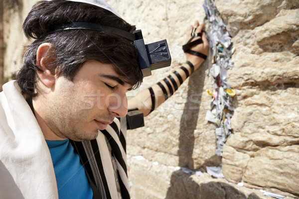 Jewish Man Praying at the Western Wall Stock photo © eldadcarin