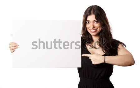 Isolated Happy Woman Pointing at Sign Stock photo © eldadcarin