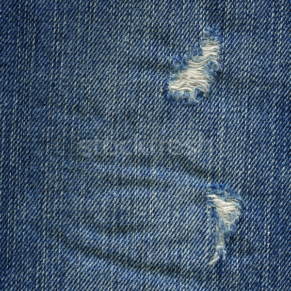 Denim Fabric Texture - Worn Out Blue Stock photo © eldadcarin