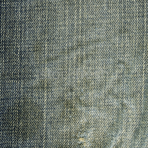 Denim Fabric Texture - Worn Out Stock photo © eldadcarin