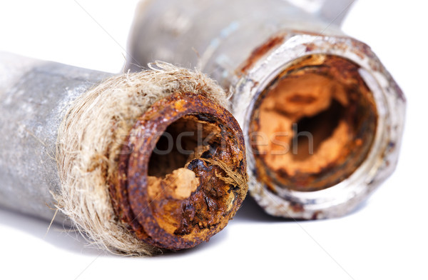 Rusty tuberías dos roto fontanería tubería Foto stock © eldadcarin