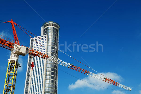 Skyscraper top & Crane Excerpt Stock photo © eldadcarin